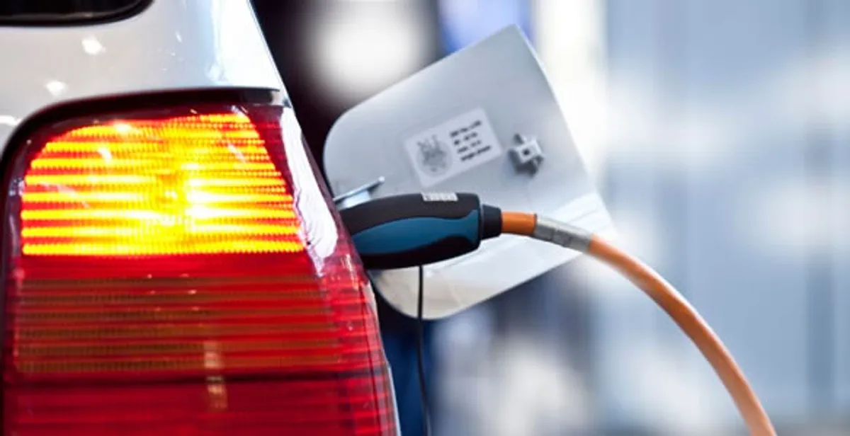 Electric car plugged into EV charger after professional installation in Myrtle Beach, SC