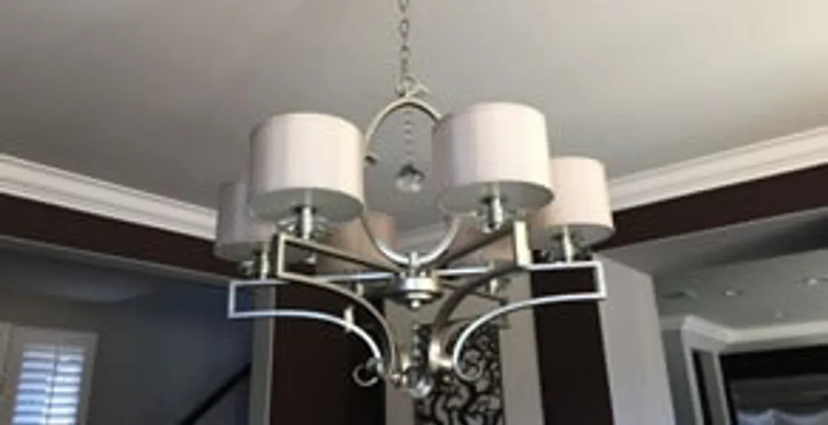 Modern chandelier installation with multiple light fixtures in Myrtle Beach, SC