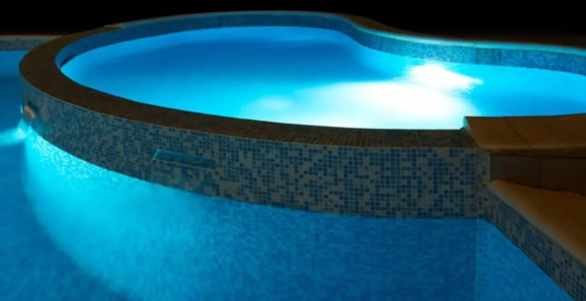 pool light installation and repair services highlighting illuminated pool interior lighting in Myrtle Beach, SC