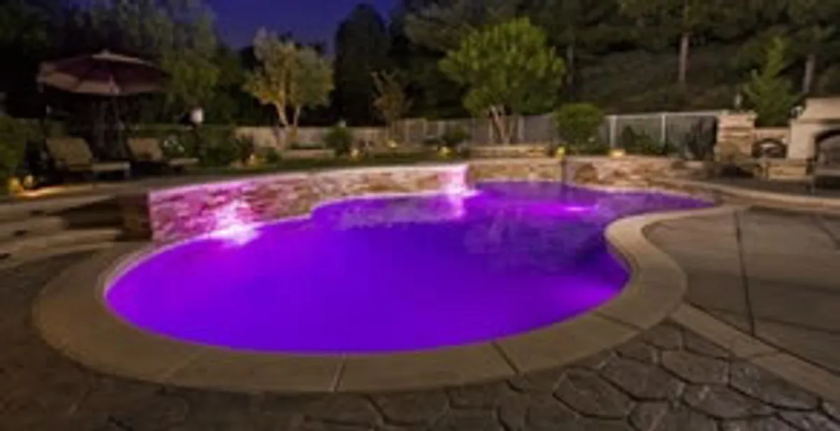 pool light installation and repair services illuminating a residential swimming pool in Myrtle Beach, SC